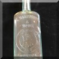 G31. Vintage glass bottle marked E. Hartshorn and Sons. 6”h - $8 